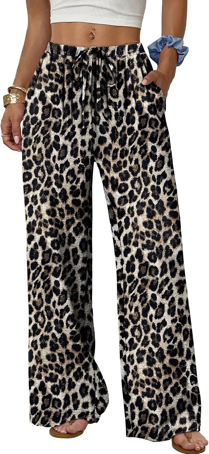 Leopard print wide-leg pants worn by a person on a white background