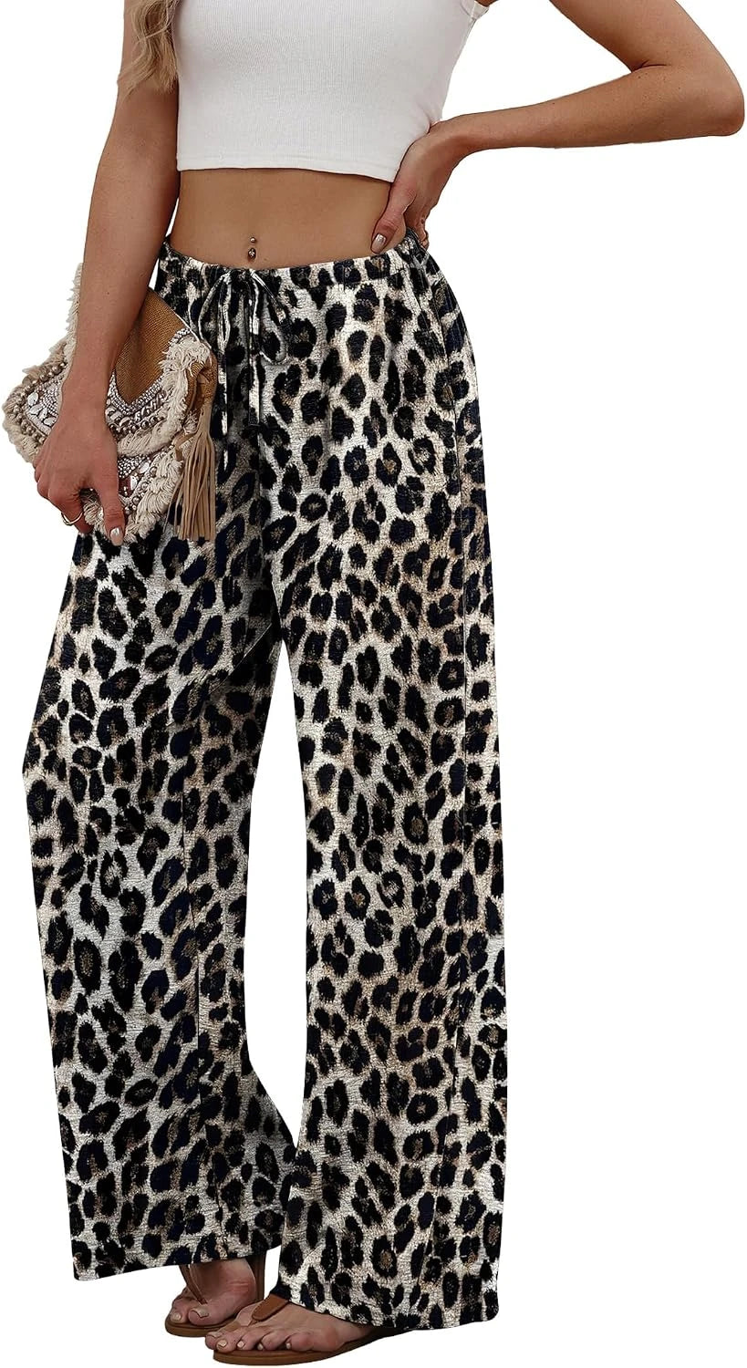 Leopard print wide-leg pants worn by a person on a white background
