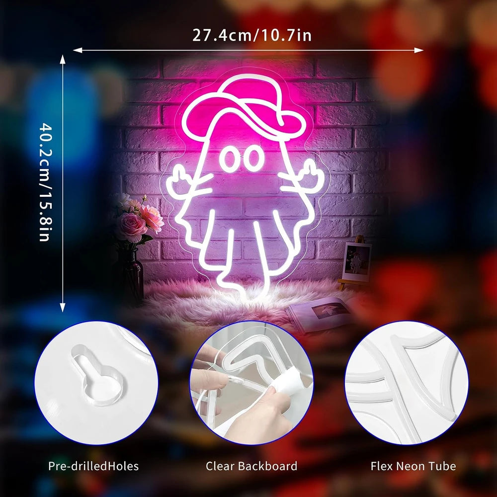 A neon-style ghost-shaped wall light glowing in pink and white, shown against a blurred brick wall background. White measurement arrows and text indicate the light is 27.