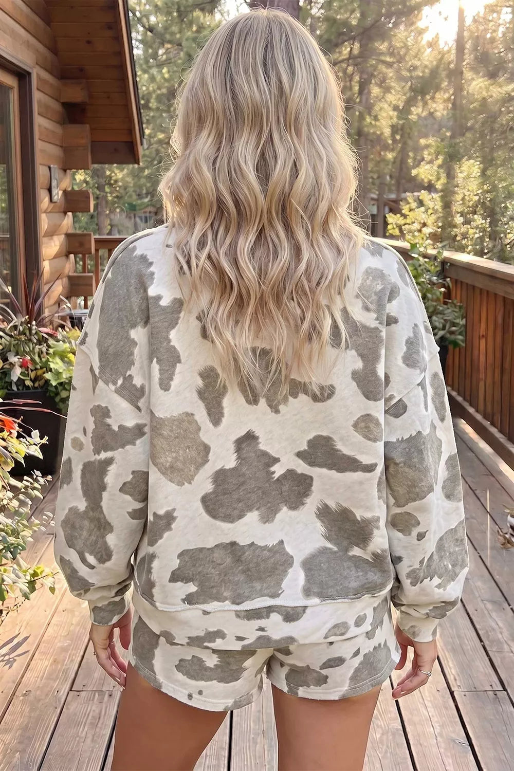 grey cowprint casual outfit featuring long sleeve top and drawstring waist shorts. Perfect for lounging around or running errands.