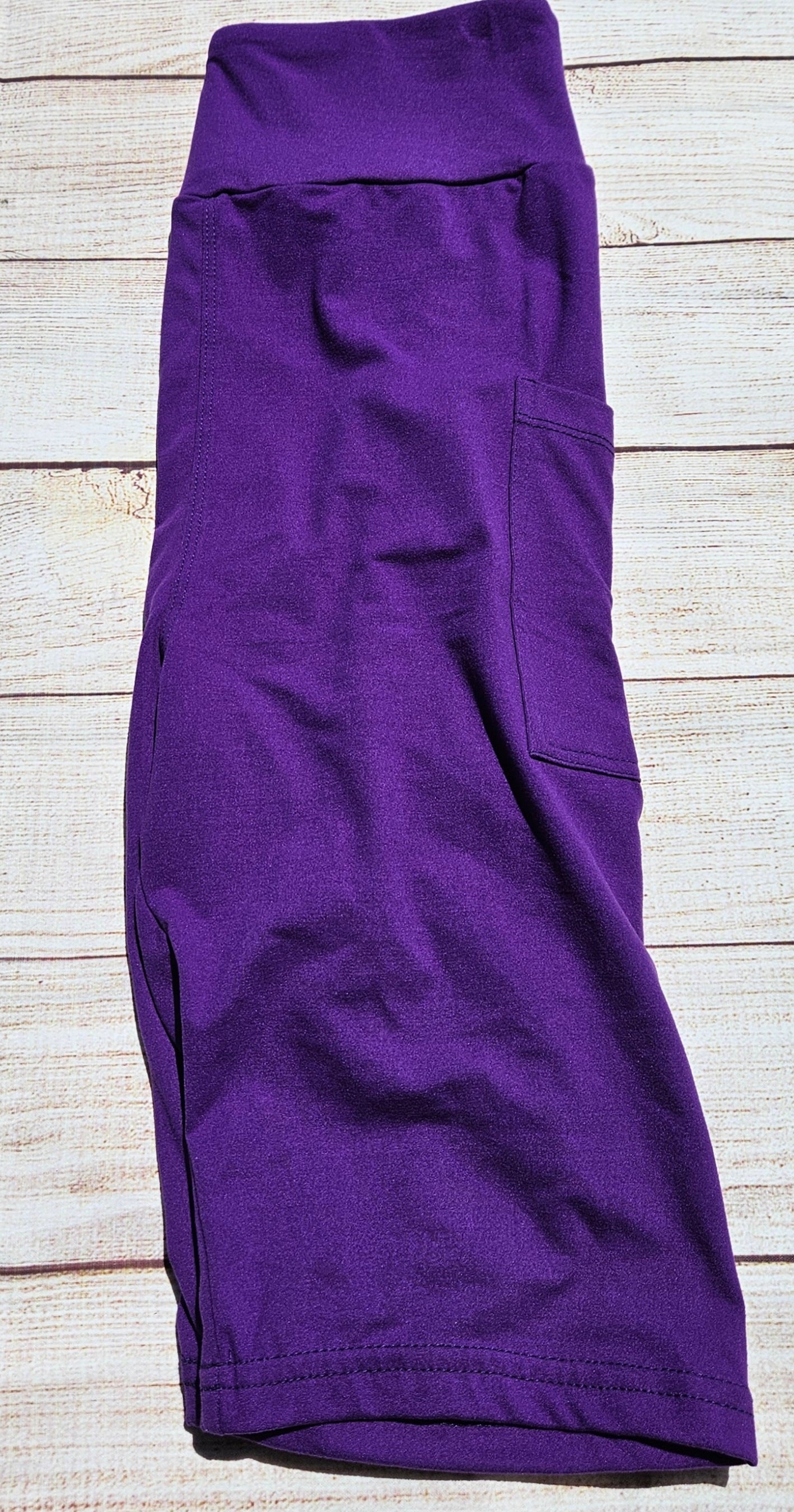Purple leggings, capris and shorts with pockets