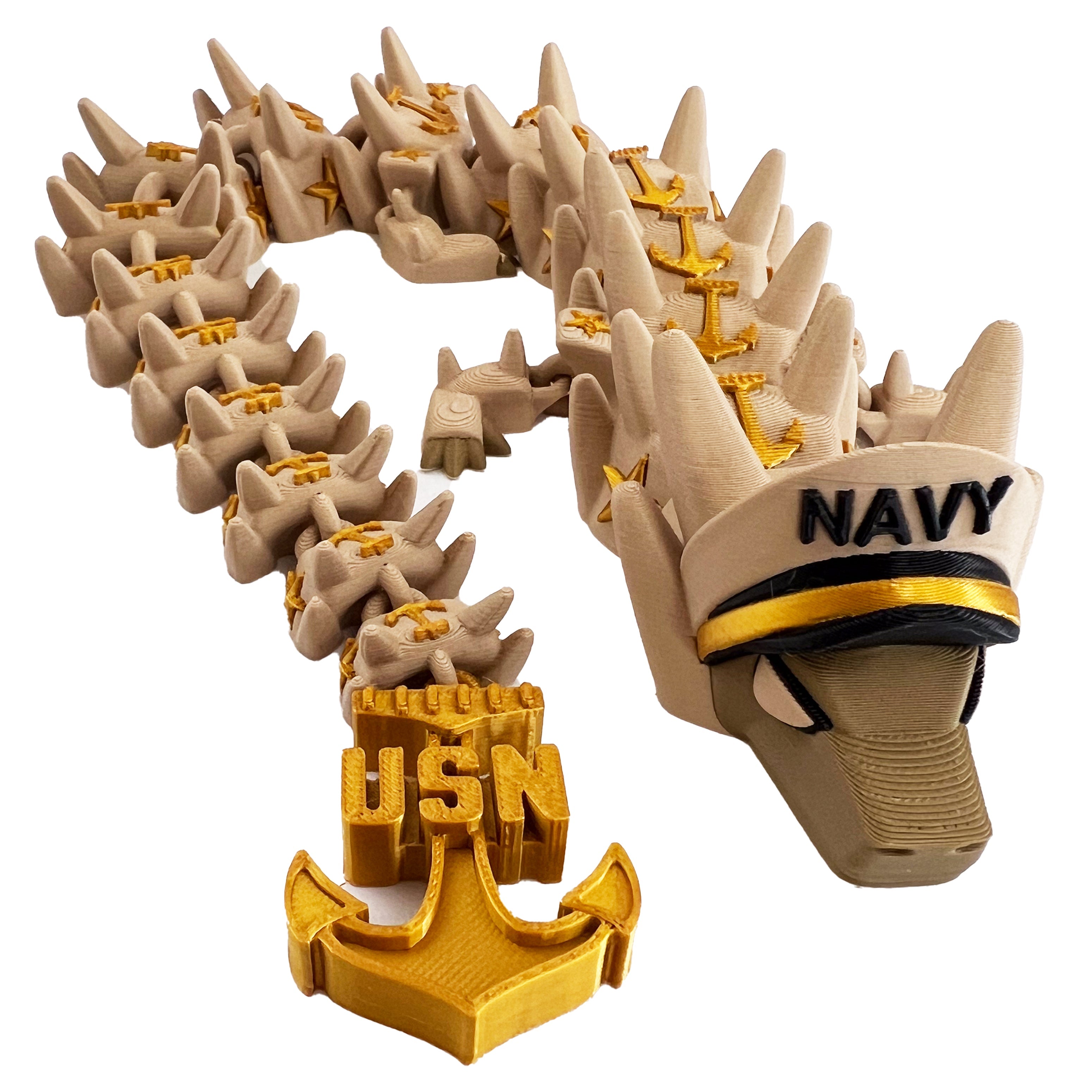 Beige and gold toy figure of a U.S. Navy character with 'USN' and anchor symbols.