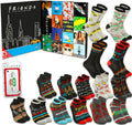 A collection of Friends-themed socks displayed alongside their packaging, including a black cityscape box, a colorful collage card, a small package of ATX socks, and multiple pairs of crew and ankle socks featuring characters and logos from the TV show.