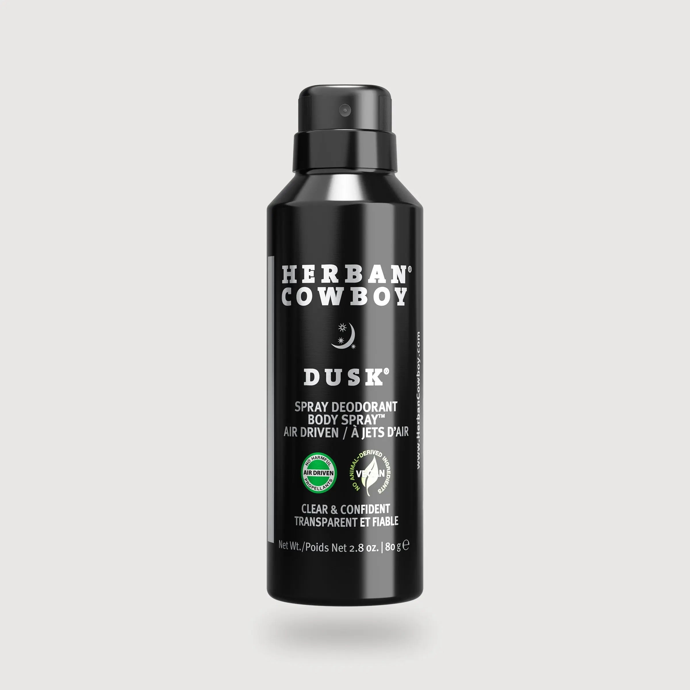 Herban Cowboy Dusk spray deodorant body spray bottle on a light gray background