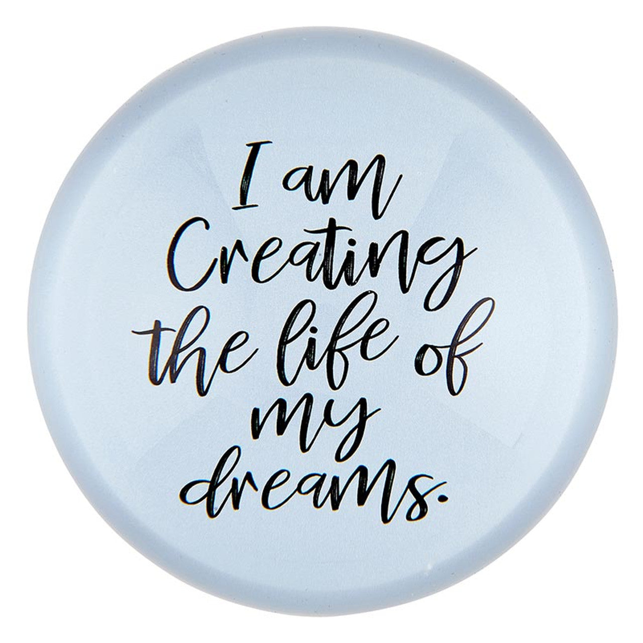 Round light blue object with motivational quote on a white background