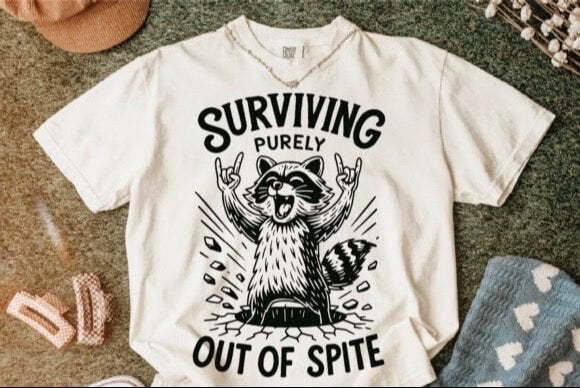 SURVIVING PURELY PUT OF SPITE GRAPIC TOP
