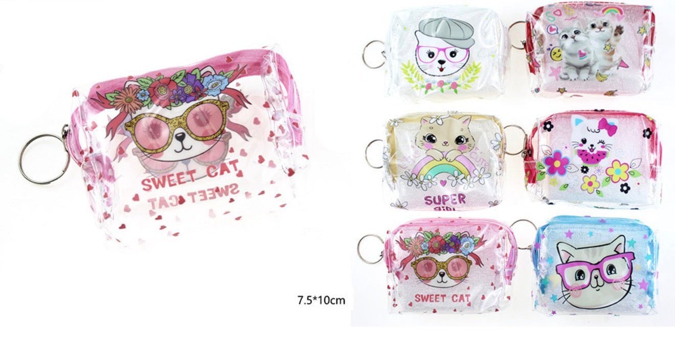 A set of small transparent zip pouches with cartoon cat illustrations and metal key rings, shown on a white background. The left pouch is larger and pink with the text 'SWEET CAT'