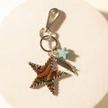 Myra Moonlight Bay Star Handtooled Leather Key Fob in Amber Turquoise Accessories