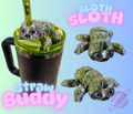 Sloth-shaped straw buddy with a green straw in a cup on a colorful background