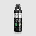 Herban Cowboy Sport spray deodorant bottle on a light gray background