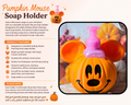 An informational product graphic for a Pumpkin Mouse Soap Holder, showing a printed orange pumpkin-shaped holder with a pink bottle inserted, alongside product features text on a white background with Halloween-themed illustrations.