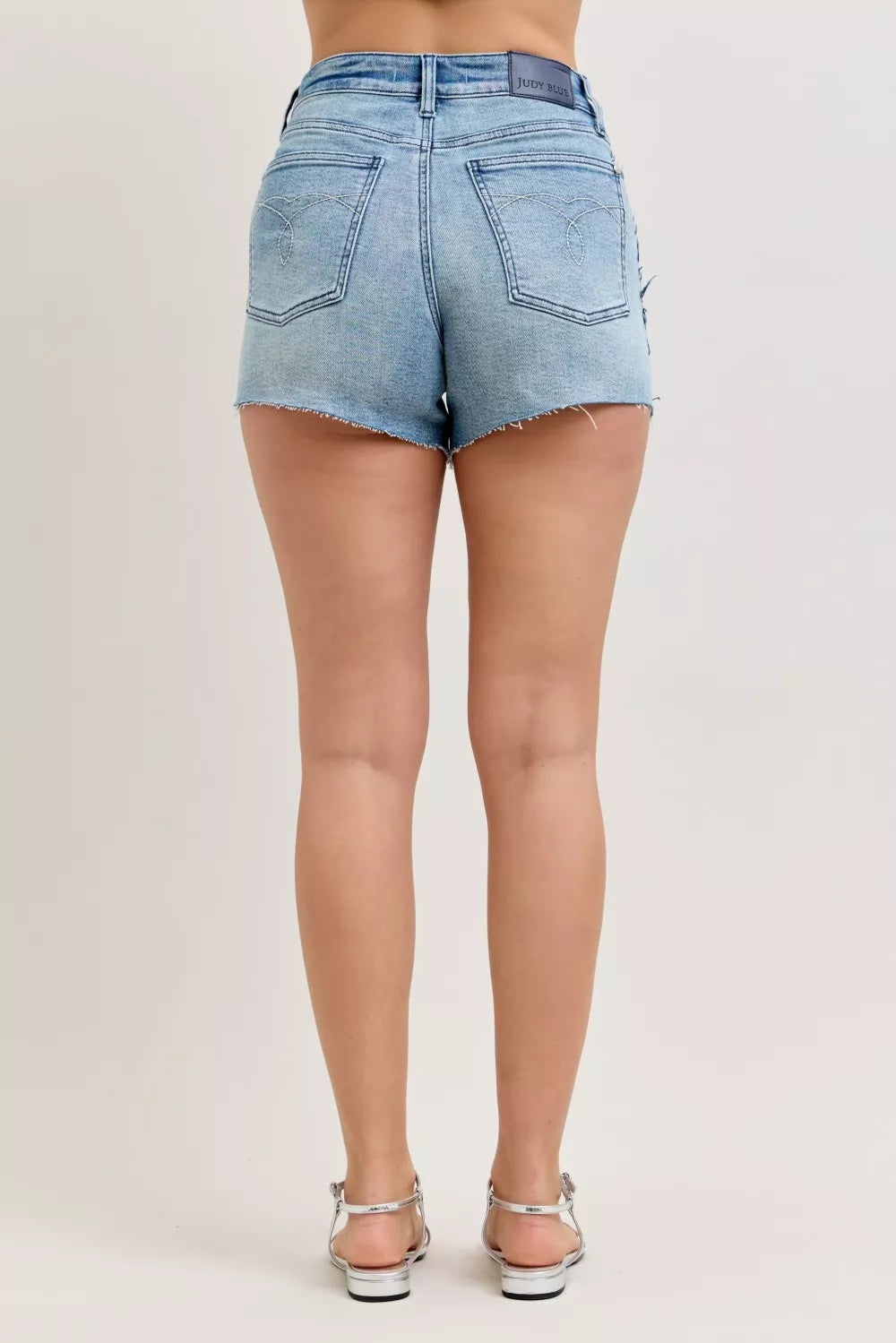 JUDY BLUE RIGID MAGIC CUT OFF DENIM SHORTS WITH RAW SIDE SEAMS Judy Blue Denim