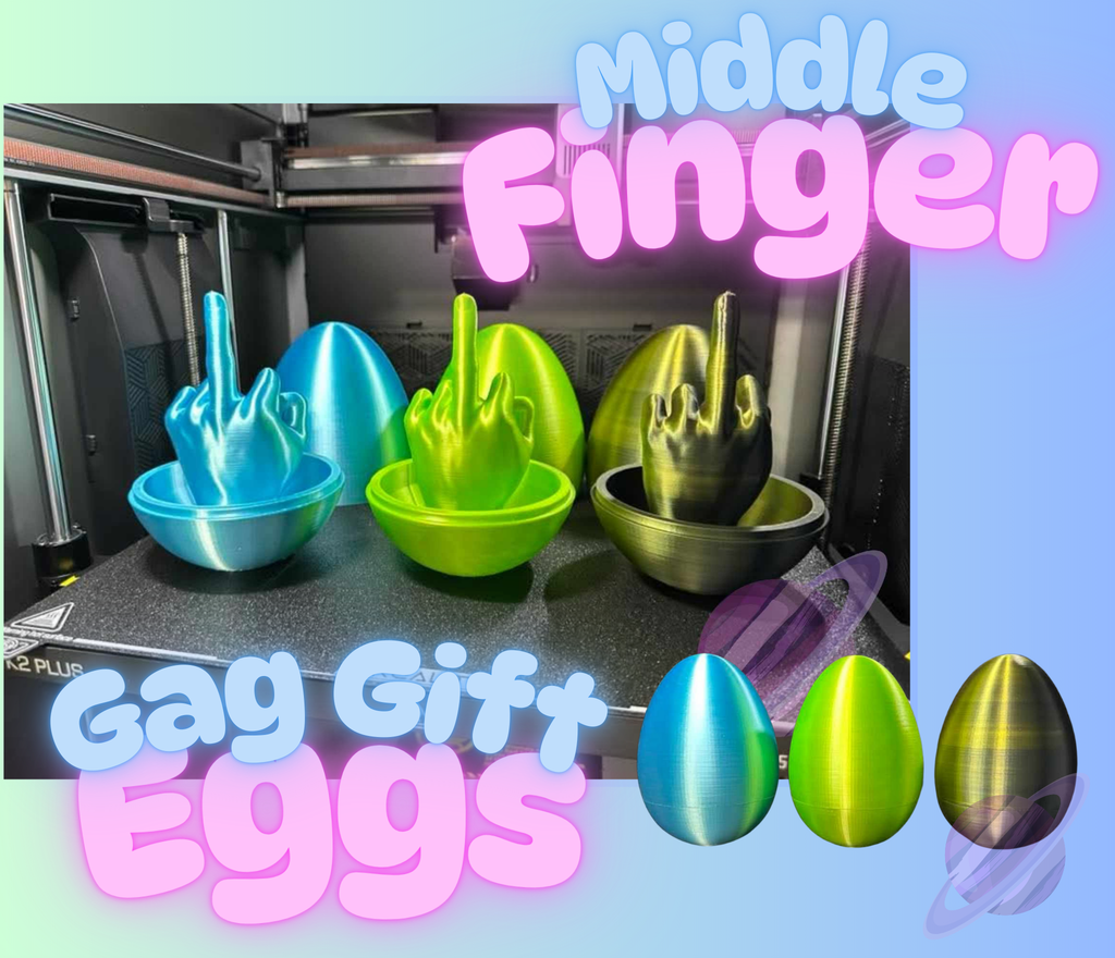Colorful 3D-printed middle finger-shaped objects on a 3D printer bed with text overlay.